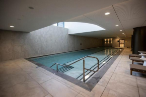 Modern 2BR Abode with Balcony View Gym Access